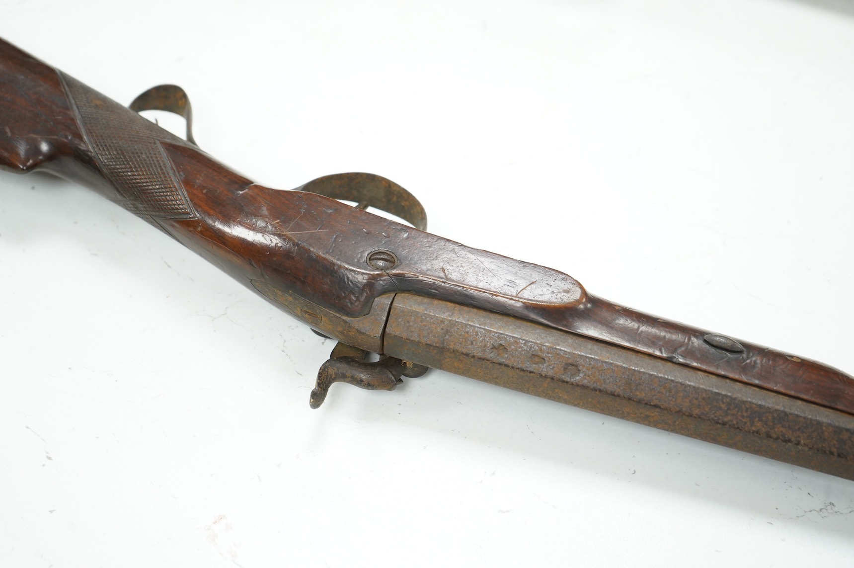 A 12 bore single barrel percussion sporting gun by J. Aston, the drum converted from flintlock, with engraved iron mounts, half stocked